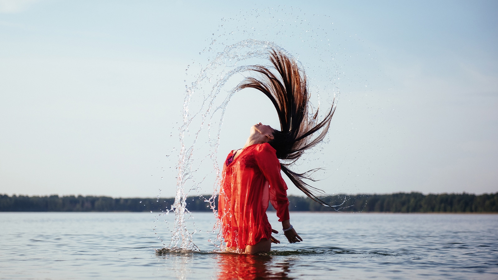 Featured image for “Effects of Swimming on Hair Color – How To Protect Your Hair Extensions”