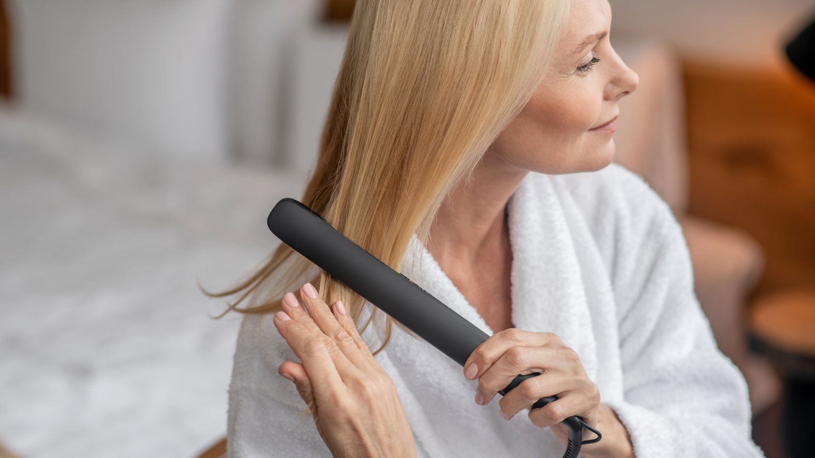 woman with perimenopause fixing her hair